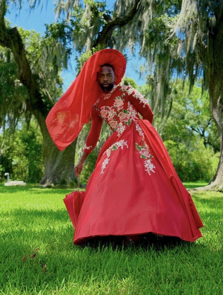 black gay man at red dress run 2026